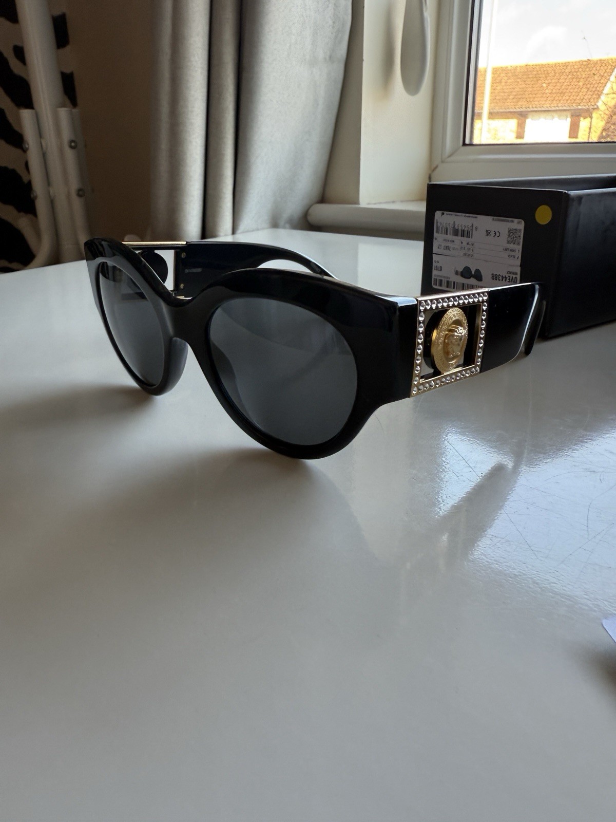 Versace Sunglasses Black frames with dark grey lens and gold medusa detail image 2