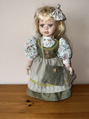 Hélène blonde porcelain doll blue eyes made in France