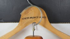 MID CENTURY WOODEN HOTEL ADVERTISING COAT HANGERS SET 4 HANGERS