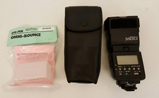 Canon Speedlite 550EX flash in case sto-fen omni bounce SN-BK08