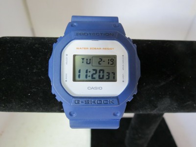g shock dw 5600 blue