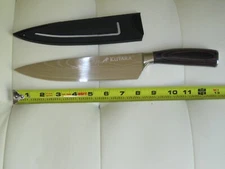 NEVER BEEN USED--KUTARA 8" CHEF KNIFE