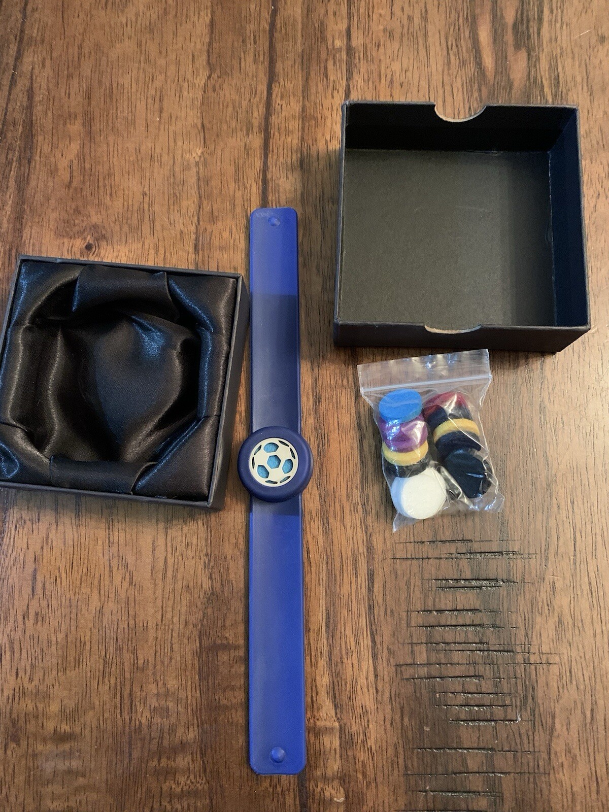 Aromatherapy diffuser bracelet in blue with soccer ball charm-image