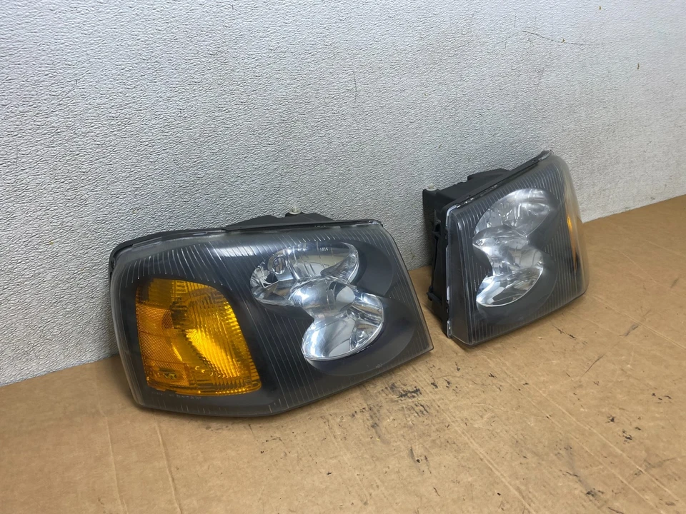 Juego de faros halógenos negros izquierda+derecha GMC Envoy 2002 a 2009 T2224 DW Foto 3 de 4