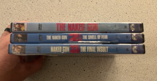 The Naked Gun Trilogy DVD The Naked Gun/ 2 1/2 The Smell Of Fear/ 33 1/3 - Foto 3 di 4