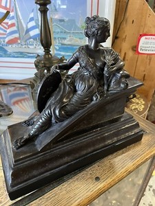 BRONZE SCULPTURE OF A RECLINING WOMAN