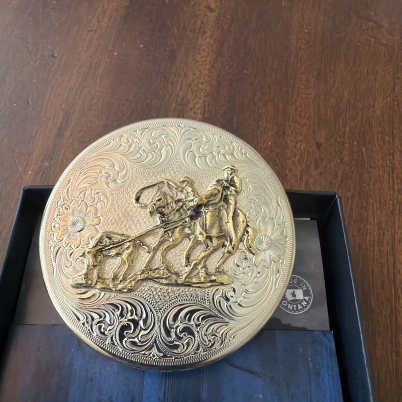 New Montana Silver Team Roping snuff can lid.
