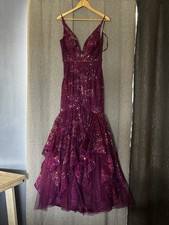 Burgundy sequin mermaid dress with ruffle detail mermaid promdress