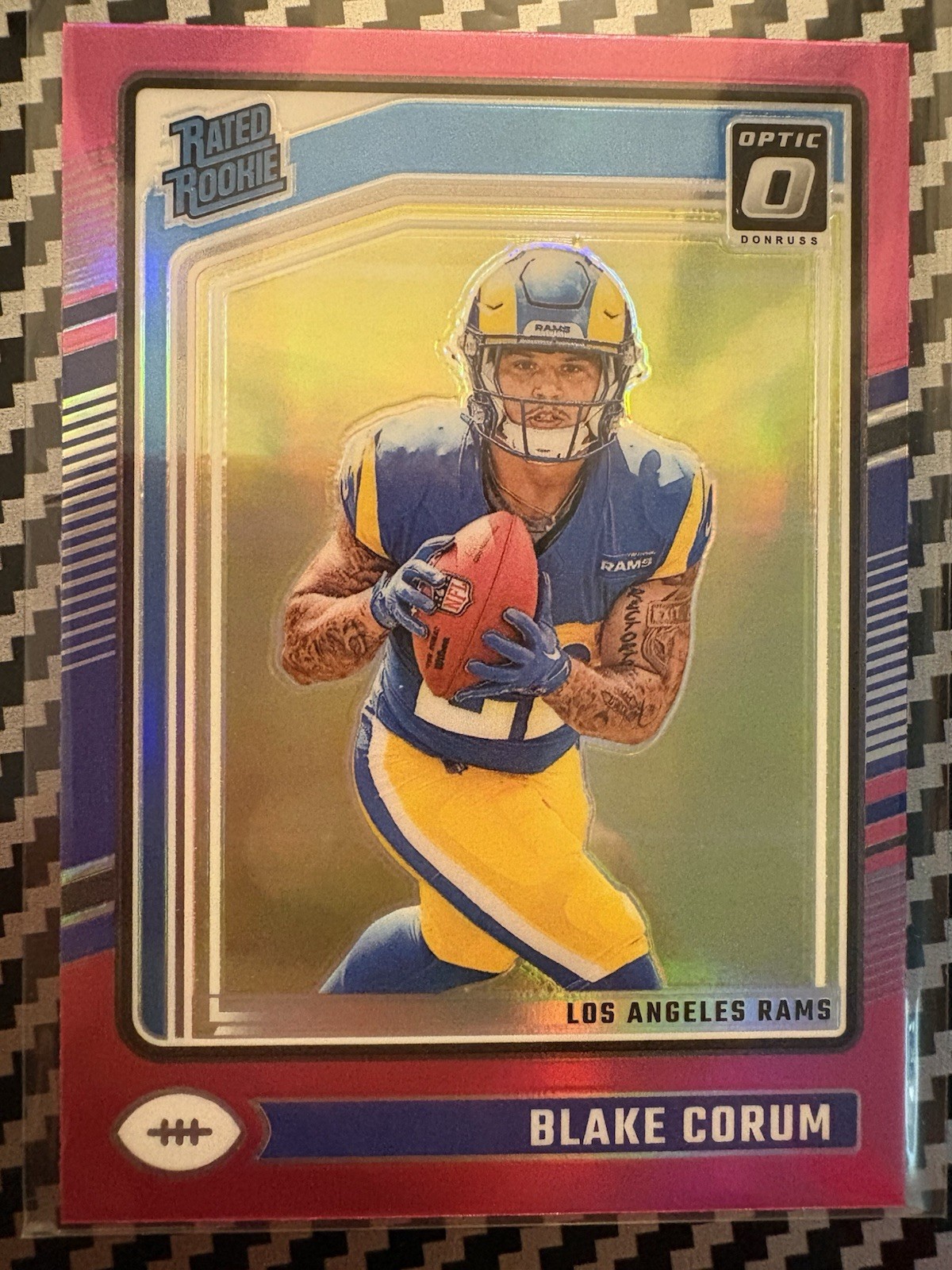 2024 Panini Donruss Optic - Rated Rookie Blake Corum #208 Pink Prizm (RC)