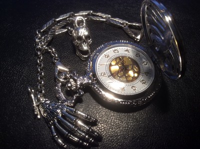 Memento mori ribcage pocket watch and chain skeleton hand and skull fob