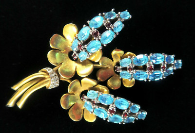 Possibly ''Ciner'' Vintage Brooch w/turquoise/red crystals gold color metal Estate