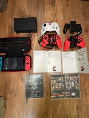 Nintendo Switch Console Neon Red & Blue Joy-Con + Super Smash Bros, Skyrim