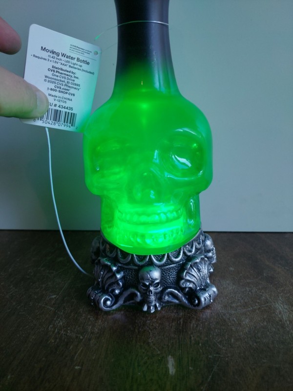 Green Skull Groovy Liquid  Animated Potion Bottle Halloween Decor