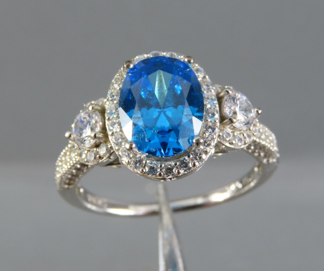 JTV/YGI Sterling Silver Cocktail Ring SWISS OVAL BLUE TOPAZ w/Clear Halo/Sides 7