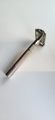  Double edge Butterfly mechanism shaving safety razor. 