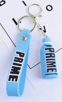 Prime Schlüsselanhänger Tropical Punch hellblau Silikonflasche Anhänger & Handschlaufe