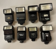 LOT OF 8 VTG CAMERA FLASHES ASSORTED BRANDS UNTESTED- SOLD AS IS FOR PARTS 0986
