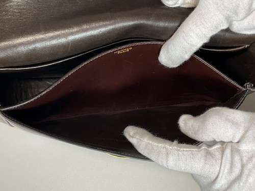 Bandolera de cuero marrón oscuro HERMÈS con hebilla dorada y correa ajustable - Imagen 8 de 13