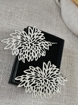 Unique design on these three inch dangle ians with french Hook