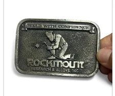 Weld With Confidence Rockmount Research & Alloys 1980 Belt Buckle By Bergamot