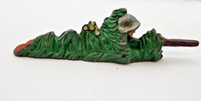 Vintage MANOIL Sniper Laying In The Grass Cast Helmet Long Rifle