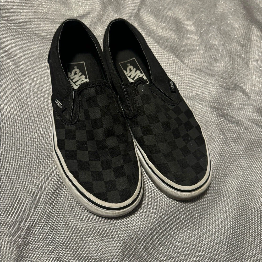 Sneakers Vans nere slip on design classico