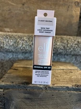 e.l.f. Skin Tint Light Coverage Dewy Finish 4 Light Neutral