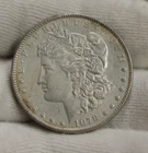 1878 7 TF US Morgan Silver Dollar $1 XF (Cleaned, Retoned)