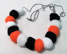 NEW UNUSED 5 FT. OF HALLOWEEN THEMED POM POM GARLAND