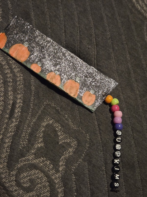 Cardboard bookmark with 'Pumpkins' Letter Dangle