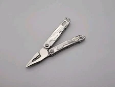 Leatherman Rev Multi-Tool - Pliers, Knife, Screwdrivers, Can Opener, File