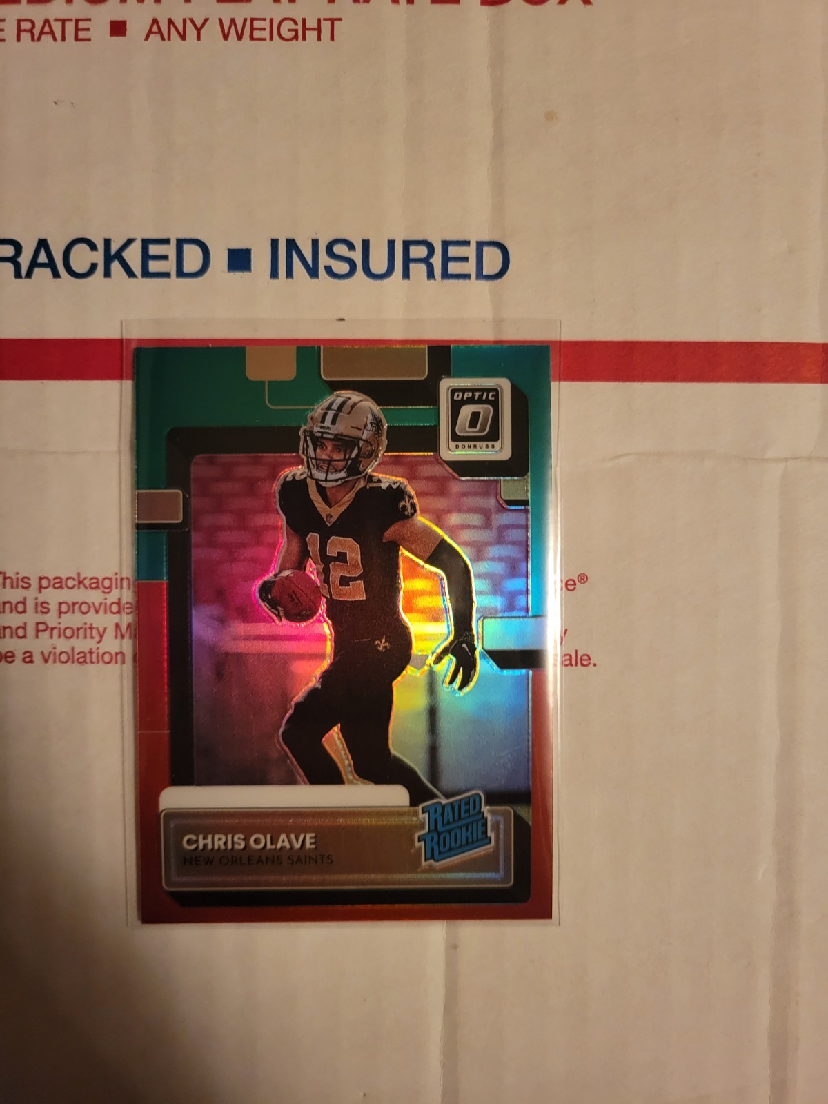 2022 Donruss Optic Chris Olave Red and Green Optic Preview Rated Rookie
