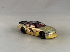 1999 Racing Champions NASCAR 10 Years Fan Appreciation #94 McDonalds Gold Chrome