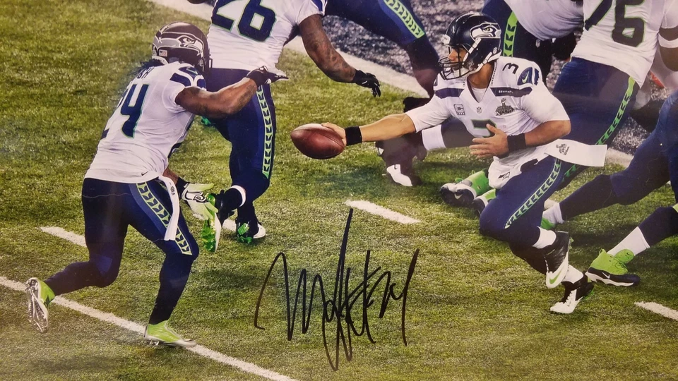 Foto autografiada por Marshawn Lynch Seattle Seahawks 16" x 20" Super Bowl XLVIII Foto 4 de 4