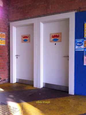 Foto 12x8 Welches soll ich verwenden? Nicht-binäre Toiletten in Fargo Village, Co c2021