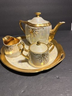 Porcelain tea set with pearlescent coating and gold trim. Oremont Bavaria. #R50