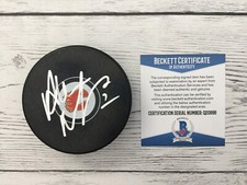 HOF Al MacInnis Signed Autographed Calgary Flames Hockey Puck Beckett BAS COA a