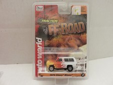 Auto World slot car 1979 Chevy Blazer, white with orange/yellow flames