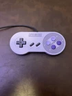 vintage Nintendo Super Nintendo Entertainment System (SNES) controller