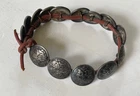 14 Mercury dimes 1941-45 bracelet or buttons on leather, likely Native American