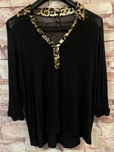 Andrea Bluse schwarz/mehrfarbig 3/4 Arm mit transparentem Rücken. Größe: 2XL.
