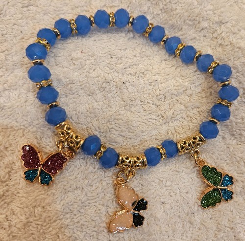 COLORFUL ADJUSTABLE BRACELET WITH 3 DIFF COLORED BUTTERFLY DANGLING GET THEM ALL - Picture 3 of 9