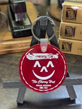 The Cherry Hut - Beulah, Michigan Keychain Vintage Red Rubber Smiling Pie 2"