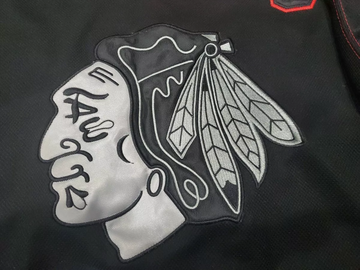Men's adidas Jonathan Toews Black Chicago Blackhawks Reverse Retro 2.0 Name & Number T-Shirt