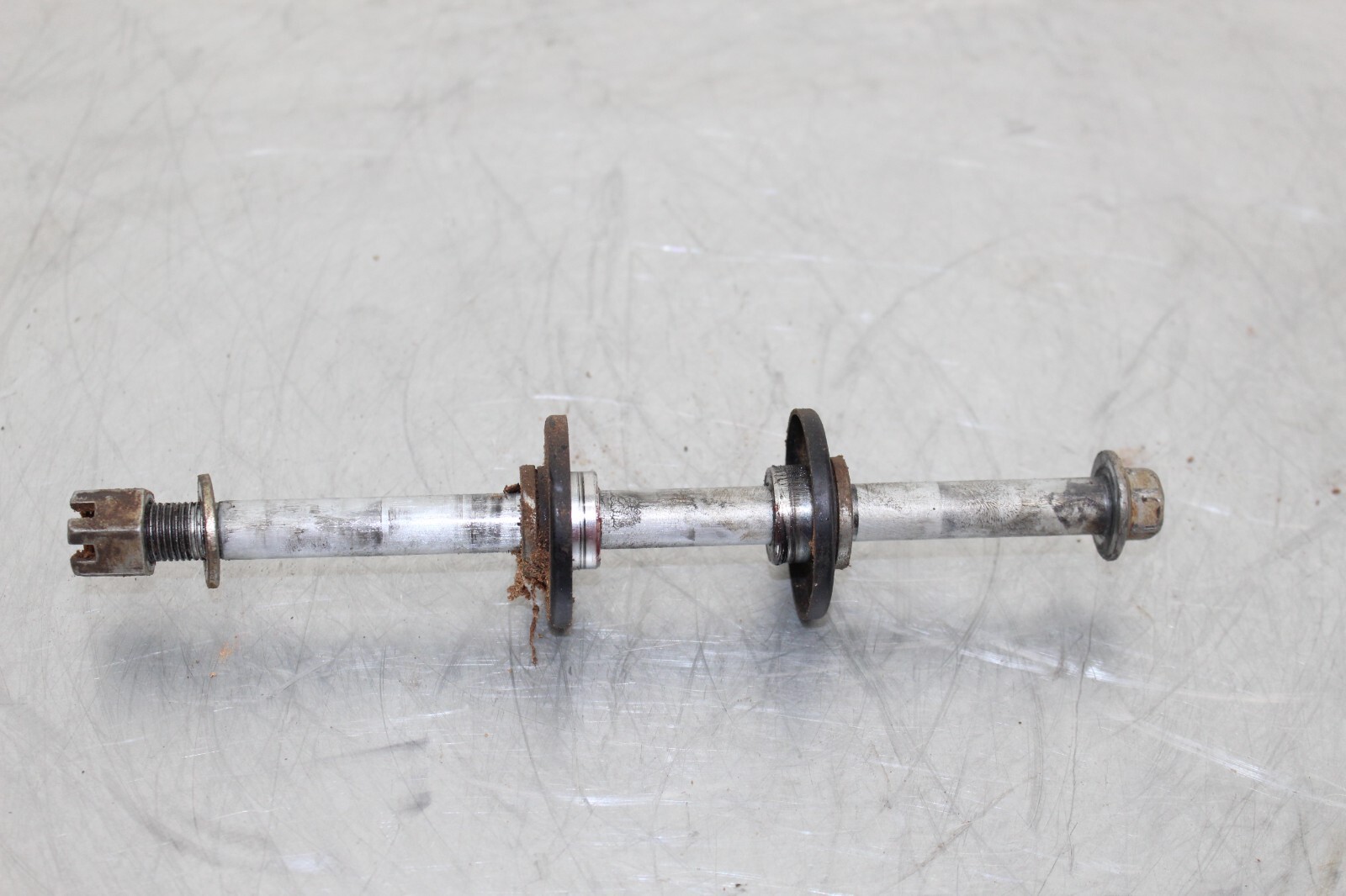 2006 KAWASAKI KX65 FRONT WHEEL AXLE SHAFT SPINDLE BOLT 06 eBay