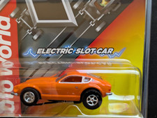 New Auto World Xtraction SC412-48 1973 Datsun 240z Orange HO Scale Slot Car