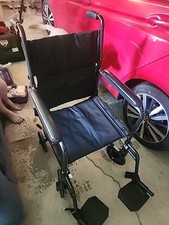McKesson Lightweight Transport Wheelchair Steel 19" W 250 lbs. Weight Capacity