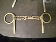 Used half cheek snaffle bit 4 3/4 in double twisted wire nickel