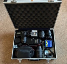 Cannon EOS 10S Camera Package Bundle With 4 Different Lenses and Equipment.