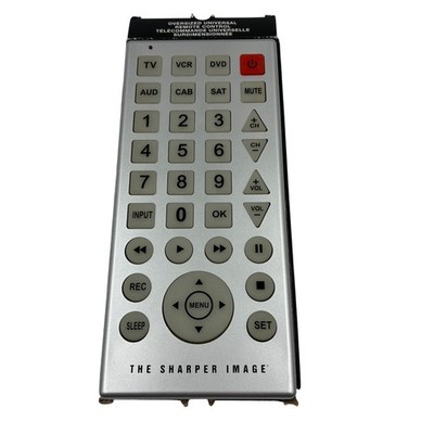 The Sharper Image Oversized Universal Remote Control Silver TV VCR DVD SAT MUTE